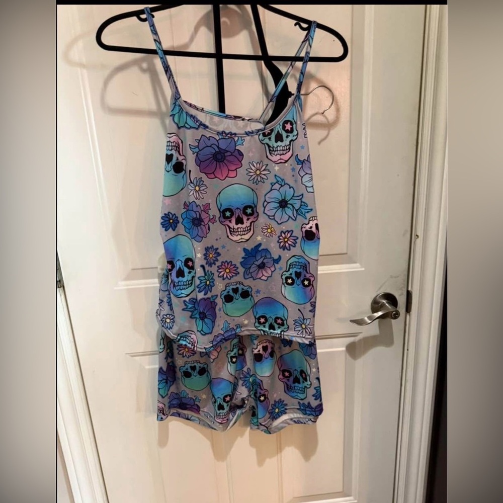 Skull & Flower Print Like new 2 sets of Pyjamas (shirts/short) size med/large